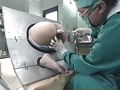 Take a look at what`s going on here. A pretty Nippon chick is the subject of an experiment and she can`t do nothing except obey and allow the scientist to do his job. He inserts different liquids in her ass, filling her up. Why is she here and what`s happening? Let`s find out!